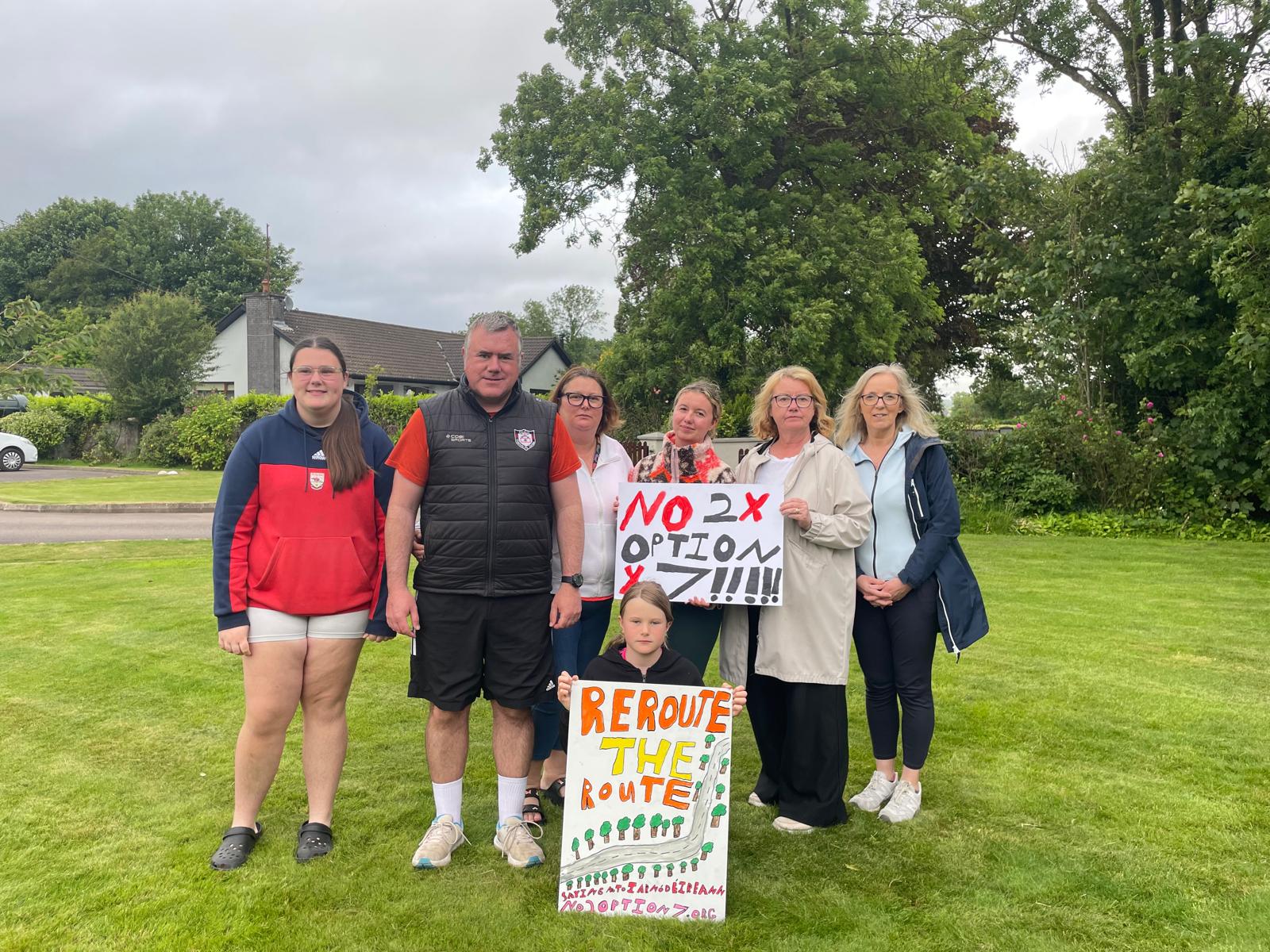 Group of residents with handmade signs